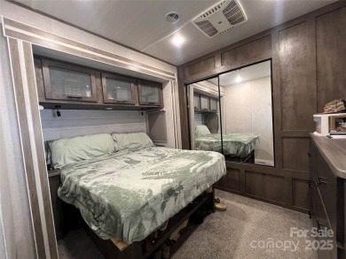 Start Lake Life Today! This 2021 spacious camper 12'x30' covered on Old North State Club at Uwharrie Point Golf community in North Carolina - for sale on GolfHomes.com, golf home, golf lot