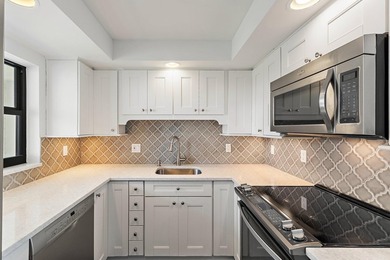 Move right in to this beautifully remodeled corner unit with on North Palm Beach Country Club in Florida - for sale on GolfHomes.com, golf home, golf lot