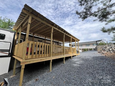 Start Lake Life Today! This 2021 spacious camper 12'x30' covered on Old North State Club at Uwharrie Point Golf community in North Carolina - for sale on GolfHomes.com, golf home, golf lot