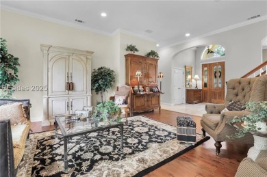 Enjoy tranquil lagoon views and a front-row seat to the 8th on Wexford Golf Club in South Carolina - for sale on GolfHomes.com, golf home, golf lot