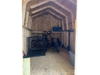 Start Lake Life Today! This 2021 spacious camper 12'x30' covered on Old North State Club at Uwharrie Point Golf community in North Carolina - for sale on GolfHomes.com, golf home, golf lot