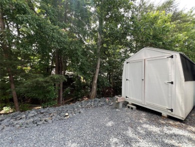 Start Lake Life Today! This 2021 spacious camper 12'x30' covered on Old North State Club at Uwharrie Point Golf community in North Carolina - for sale on GolfHomes.com, golf home, golf lot