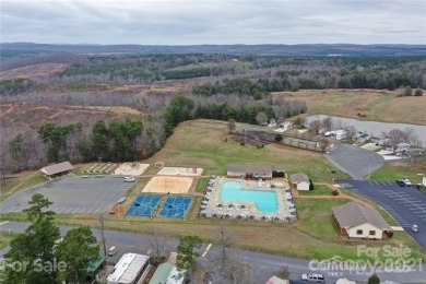 Start Lake Life Today! This 2021 spacious camper 12'x30' covered on Old North State Club at Uwharrie Point Golf community in North Carolina - for sale on GolfHomes.com, golf home, golf lot