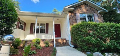 Single story living tucked away amidst mature crepe myrtle & on Seven Lakes Country Club in North Carolina - for sale on GolfHomes.com, golf home, golf lot