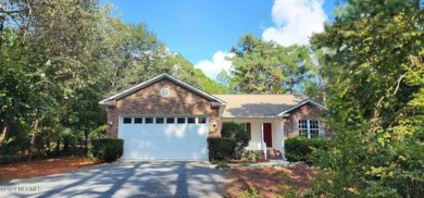 Single story living tucked away amidst mature crepe myrtle & on Seven Lakes Country Club in North Carolina - for sale on GolfHomes.com, golf home, golf lot