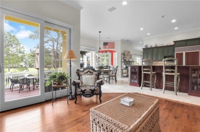 Enjoy tranquil lagoon views and a front-row seat to the 8th on Wexford Golf Club in South Carolina - for sale on GolfHomes.com, golf home, golf lot