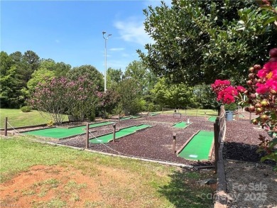 Start Lake Life Today! This 2021 spacious camper 12'x30' covered on Old North State Club at Uwharrie Point Golf community in North Carolina - for sale on GolfHomes.com, golf home, golf lot