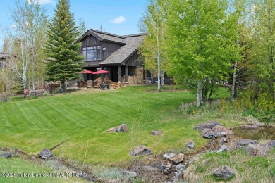 Situated in one of the premier settings within the Tributary on Huntsman Springs Golf Club in Idaho - for sale on GolfHomes.com, golf home, golf lot