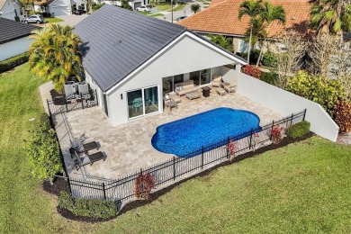 Stunning Remodeled Pool Home with Breathtaking Views & Country on Boca Woods Country Club in Florida - for sale on GolfHomes.com, golf home, golf lot