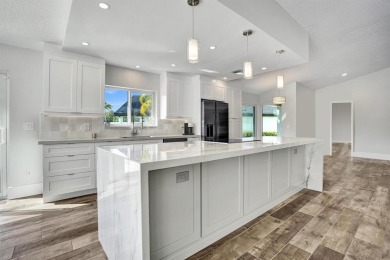 Stunning Remodeled Pool Home with Breathtaking Views & Country on Boca Woods Country Club in Florida - for sale on GolfHomes.com, golf home, golf lot