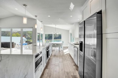 Stunning Remodeled Pool Home with Breathtaking Views & Country on Boca Woods Country Club in Florida - for sale on GolfHomes.com, golf home, golf lot