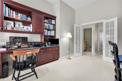 Enjoy tranquil lagoon views and a front-row seat to the 8th on Wexford Golf Club in South Carolina - for sale on GolfHomes.com, golf home, golf lot