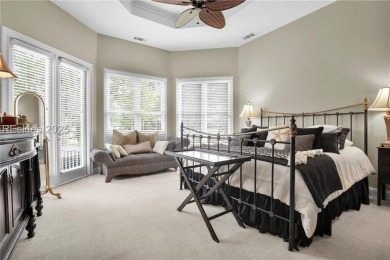 Enjoy tranquil lagoon views and a front-row seat to the 8th on Wexford Golf Club in South Carolina - for sale on GolfHomes.com, golf home, golf lot