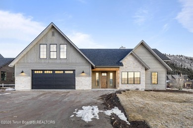 Immerse yourself in the best of Teton Valley living with this on Teton Reserve in Idaho - for sale on GolfHomes.com, golf home, golf lot