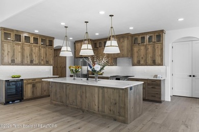 Immerse yourself in the best of Teton Valley living with this on Teton Reserve in Idaho - for sale on GolfHomes.com, golf home, golf lot