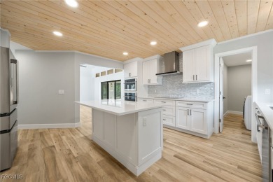 Experience this Fully Renovated Pool Home with Spa in the on The Forest Country Club in Florida - for sale on GolfHomes.com, golf home, golf lot