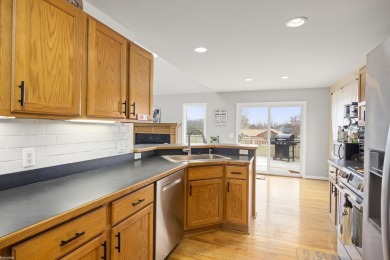 This 5 bedroom home located in a tranquil setting on over 1.5 on Springfield Oaks Golf Course in Michigan - for sale on GolfHomes.com, golf home, golf lot