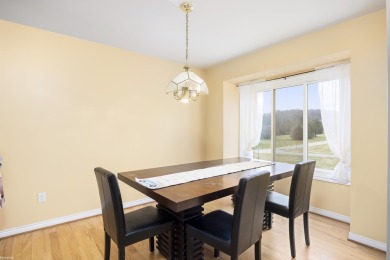 This 5 bedroom home located in a tranquil setting on over 1.5 on Springfield Oaks Golf Course in Michigan - for sale on GolfHomes.com, golf home, golf lot