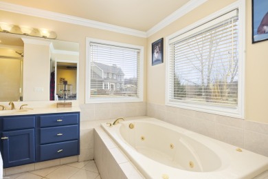 This 5 bedroom home located in a tranquil setting on over 1.5 on Springfield Oaks Golf Course in Michigan - for sale on GolfHomes.com, golf home, golf lot