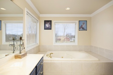 This 5 bedroom home located in a tranquil setting on over 1.5 on Springfield Oaks Golf Course in Michigan - for sale on GolfHomes.com, golf home, golf lot