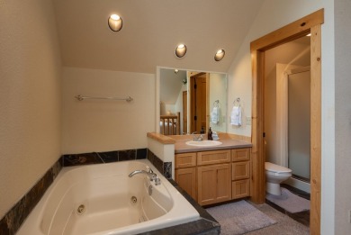 This charming chalet-style home offers a perfect blend of rustic on Eagle Crest Golf Resort - Resort Course in Oregon - for sale on GolfHomes.com, golf home, golf lot