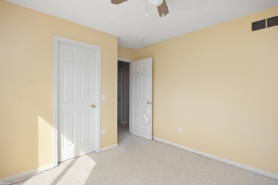 This 5 bedroom home located in a tranquil setting on over 1.5 on Springfield Oaks Golf Course in Michigan - for sale on GolfHomes.com, golf home, golf lot