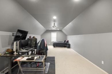 This 5 bedroom home located in a tranquil setting on over 1.5 on Springfield Oaks Golf Course in Michigan - for sale on GolfHomes.com, golf home, golf lot
