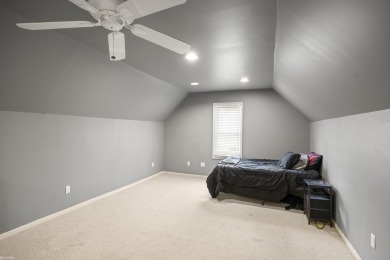 This 5 bedroom home located in a tranquil setting on over 1.5 on Springfield Oaks Golf Course in Michigan - for sale on GolfHomes.com, golf home, golf lot