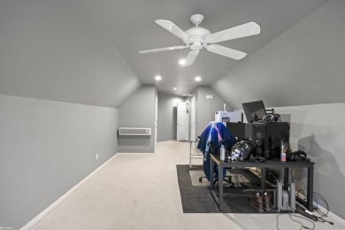This 5 bedroom home located in a tranquil setting on over 1.5 on Springfield Oaks Golf Course in Michigan - for sale on GolfHomes.com, golf home, golf lot
