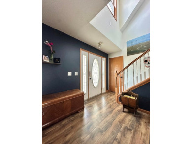 Take in the peaceful views from the large front porch, relax on on Prairie View Golf and Grill in Iowa - for sale on GolfHomes.com, golf home, golf lot