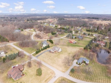 This 5 bedroom home located in a tranquil setting on over 1.5 on Springfield Oaks Golf Course in Michigan - for sale on GolfHomes.com, golf home, golf lot