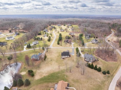 This 5 bedroom home located in a tranquil setting on over 1.5 on Springfield Oaks Golf Course in Michigan - for sale on GolfHomes.com, golf home, golf lot
