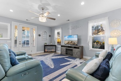 This charming 2-bedroom, 2-bath beach bungalow is one you'll on Barefoot Resort and Golf Club  in South Carolina - for sale on GolfHomes.com, golf home, golf lot