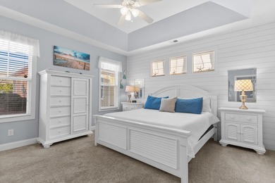 This charming 2-bedroom, 2-bath beach bungalow is one you'll on Barefoot Resort and Golf Club  in South Carolina - for sale on GolfHomes.com, golf home, golf lot