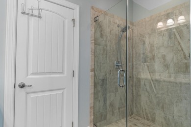 This charming 2-bedroom, 2-bath beach bungalow is one you'll on Barefoot Resort and Golf Club  in South Carolina - for sale on GolfHomes.com, golf home, golf lot