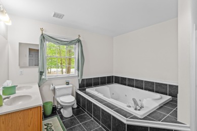This impeccably maintained 3-bedroom, 4-bathroom contemporary on Country Club of the Poconos Golf Course in Pennsylvania - for sale on GolfHomes.com, golf home, golf lot