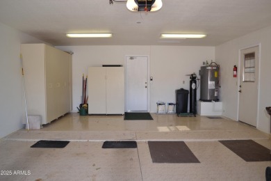 This Camelback model with vaulted ceilings and enclosed patio on Westbrook Village Golf Club in Arizona - for sale on GolfHomes.com, golf home, golf lot