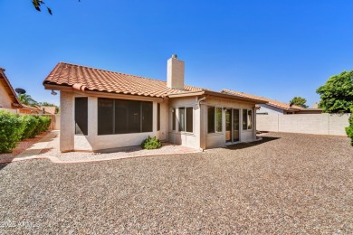 This Camelback model with vaulted ceilings and enclosed patio on Westbrook Village Golf Club in Arizona - for sale on GolfHomes.com, golf home, golf lot