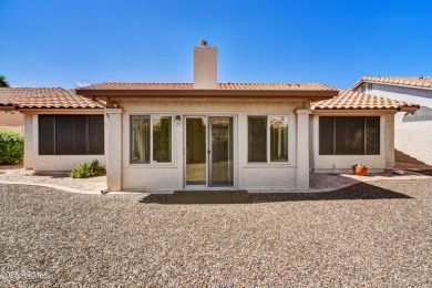 This Camelback model with vaulted ceilings and enclosed patio on Westbrook Village Golf Club in Arizona - for sale on GolfHomes.com, golf home, golf lot