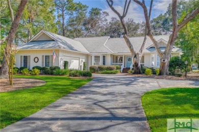 Situated on a beautiful lot overlooking a lagoon and the 17th on The Landings Club - Palmetto in Georgia - for sale on GolfHomes.com, golf home, golf lot