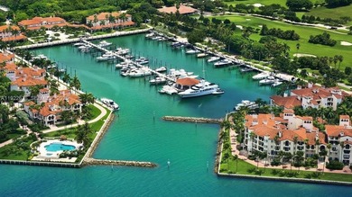 An exceptional flow-through residence at Palazzo Della Luna on Fisher Island Club in Florida - for sale on GolfHomes.com, golf home, golf lot