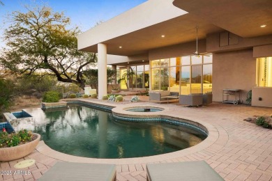 Located in the prestigious guard-gated community of Candlewood on Troon North Golf Club  in Arizona - for sale on GolfHomes.com, golf home, golf lot