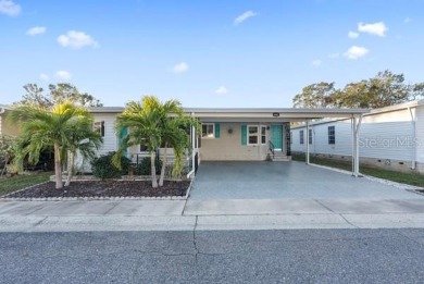 What an awesome home with an Island vibe.   TRIPLE WIDE 3 on Fairway Village Golf Course in Florida - for sale on GolfHomes.com, golf home, golf lot