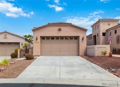 Experience the perfect blend of modern comfort and resort-style on Laughlin Ranch Golf Club in Arizona - for sale on GolfHomes.com, golf home, golf lot