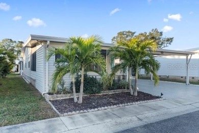 What an awesome home with an Island vibe.   TRIPLE WIDE 3 on Fairway Village Golf Course in Florida - for sale on GolfHomes.com, golf home, golf lot