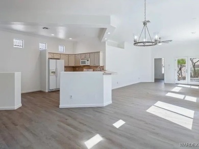 Experience the perfect blend of modern comfort and resort-style on Laughlin Ranch Golf Club in Arizona - for sale on GolfHomes.com, golf home, golf lot