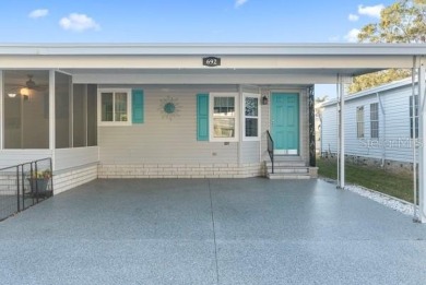 What an awesome home with an Island vibe.   TRIPLE WIDE 3 on Fairway Village Golf Course in Florida - for sale on GolfHomes.com, golf home, golf lot