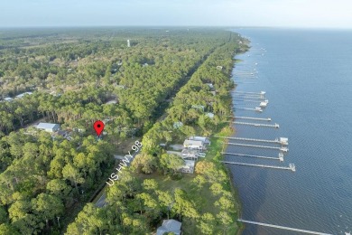 TREMENDOUS PRICE IMPROVEMENT! Your boat could be home. Have you on St. James Bay in Florida - for sale on GolfHomes.com, golf home, golf lot