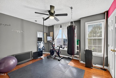 Welcome to 5351 Cog Hill Court, a rare end-unit townhome in the on Hedingham Golf and Athletic Club in North Carolina - for sale on GolfHomes.com, golf home, golf lot