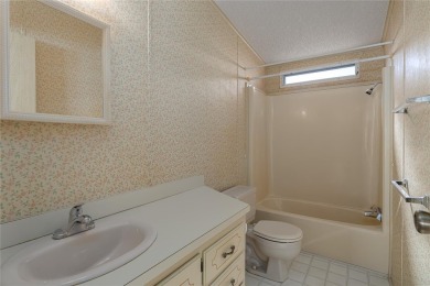 Seller Motivated! Welcome to this charming 2-bedroom, 2-bathroom on Imperial Lakewoods Golf Club in Florida - for sale on GolfHomes.com, golf home, golf lot